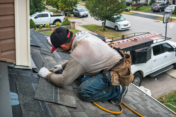 Professional Roofing technician working in East Freedom, PA